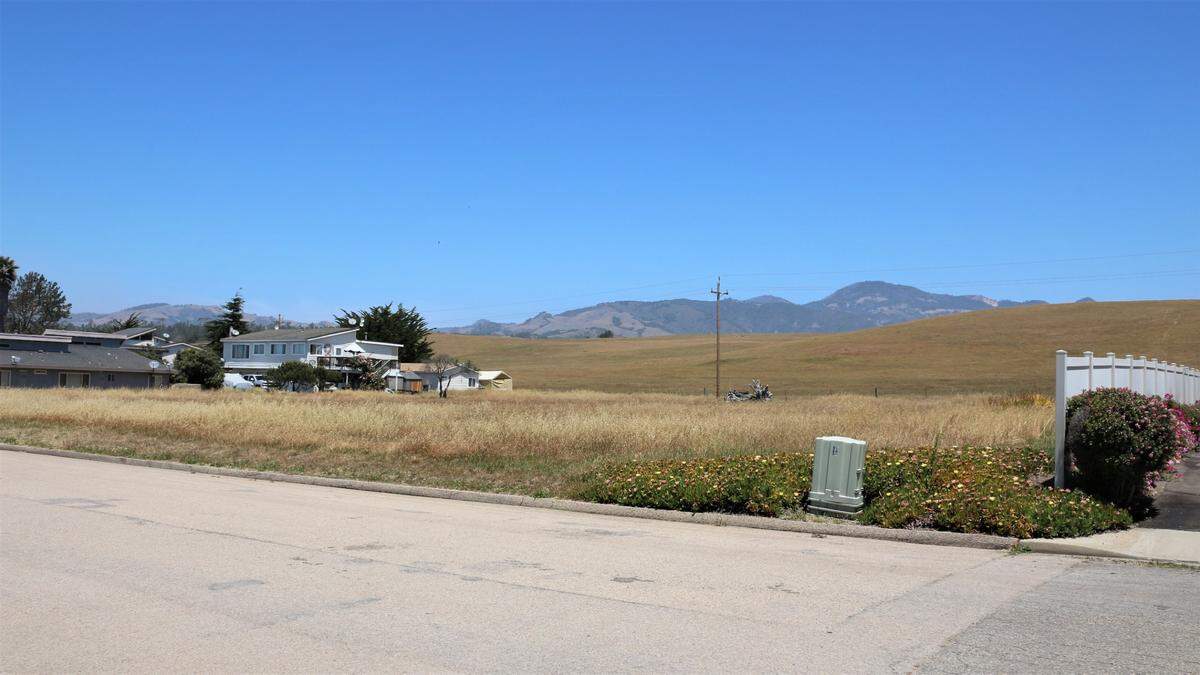 Robert Hather owns this 1.1-acre lot in San Simeon, California. He’s waited since 2004 to build. The San Simeon Community Services District recently granted Hather a will-serve letter, paving the way for him to get permits from the county to construct 15 homes on the property.