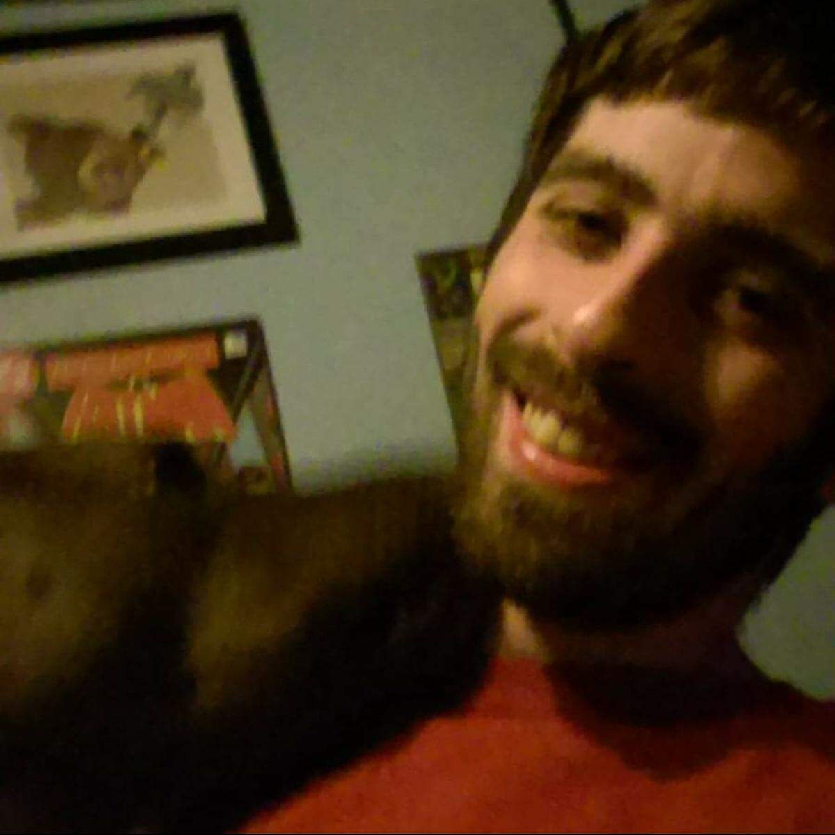 Justin Bice, 29, is pictured with his family’s dog, Coda. The Paso Robles man was allegedly shot in the head by attempted murder suspect Carlos Luis Chavez.