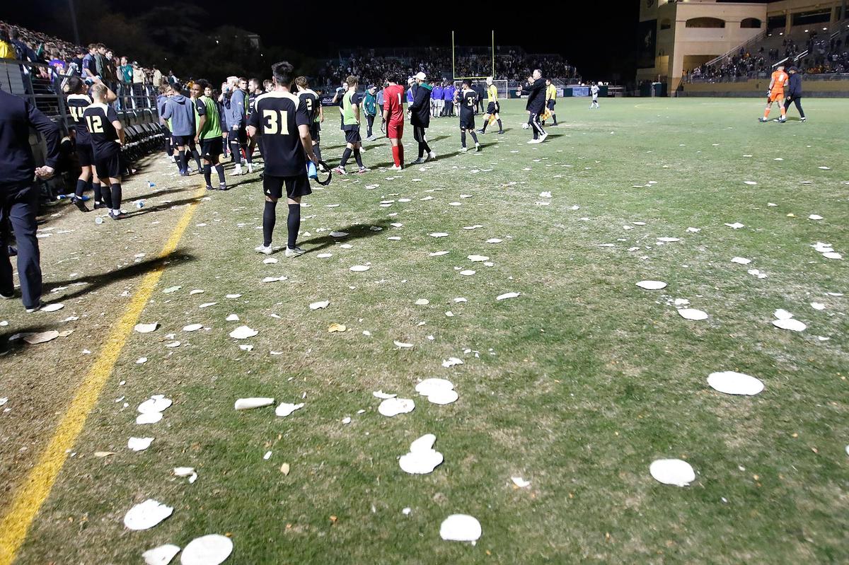 Tortillas litter the field at the annual Blue Green Rivalry soccer game between Cal Poly and UCSB on Oct. 16, 2021. Cal Poly is replacing the grass field with artificial turf.