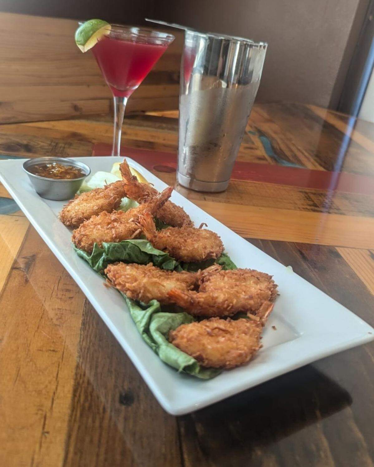 Coconut shrimp is served with sweet and spicy dipping sauce for $16 at Atascadero Bistro.