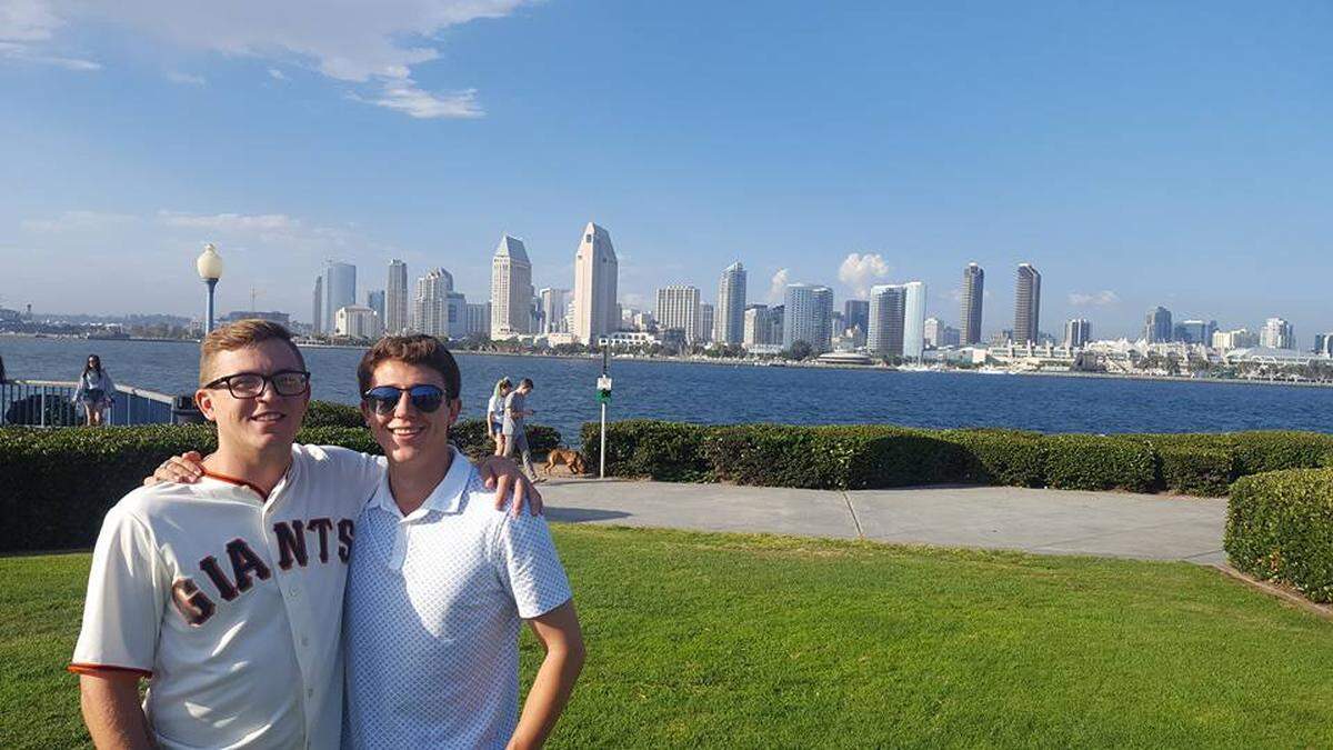 Jordan Boner, left, is pictured with a friend in San Diego. Boner died Monday after he was found gravely injured in Phoenix, Arizona, on Friday.