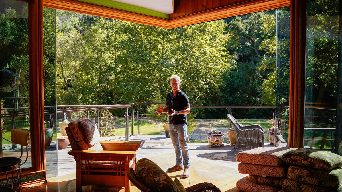 Longtime former San Luis Obispo County resident Reggie Whibley’s home north of Lopez Lake is a treehouse-like structure built on metal legs painted to resemble trees Tuesday, Oct. 29, 2024. Following Whibley’s death in 2020, the property went up for sale, featuring views of the surrounding canyon, custom woodworking and design and a fully converted Beachcraft airplane parked in the backyard, which serves as the guest lodging.