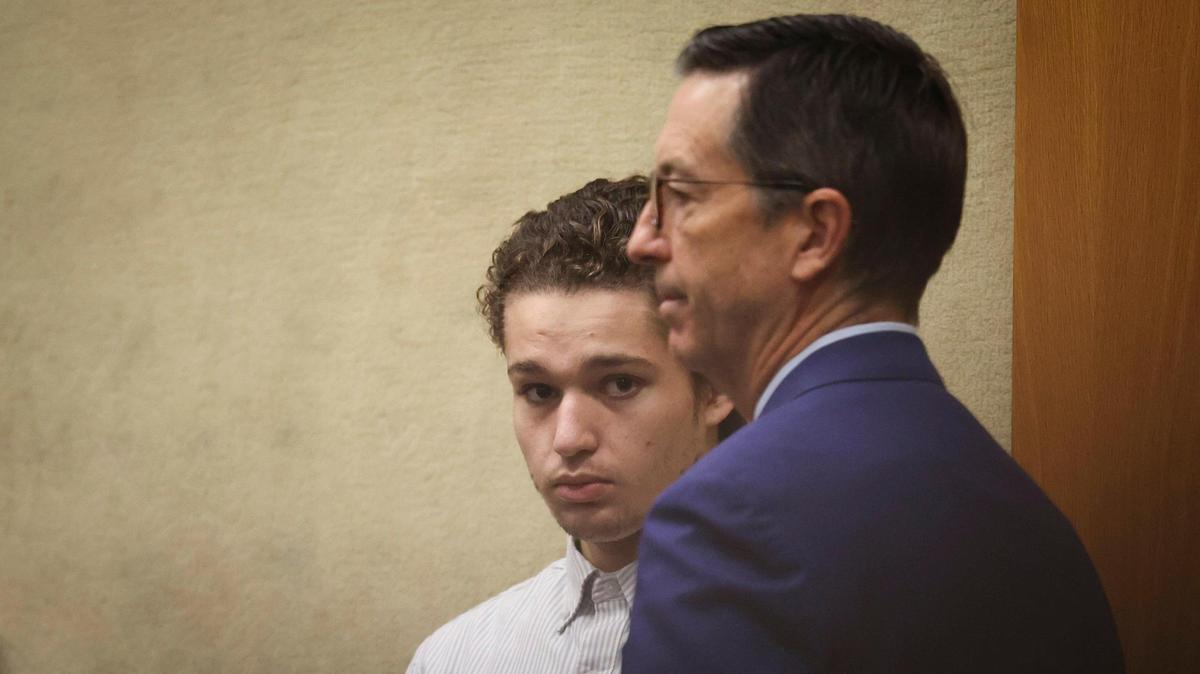 Tyler Stevens, 21, who is charged with the murder of Todd Joseph Pinion, stands at left with attorney Matthew Kraut during a hearing in San Luis Obispo Superior Court on Nov. 21, 2024.