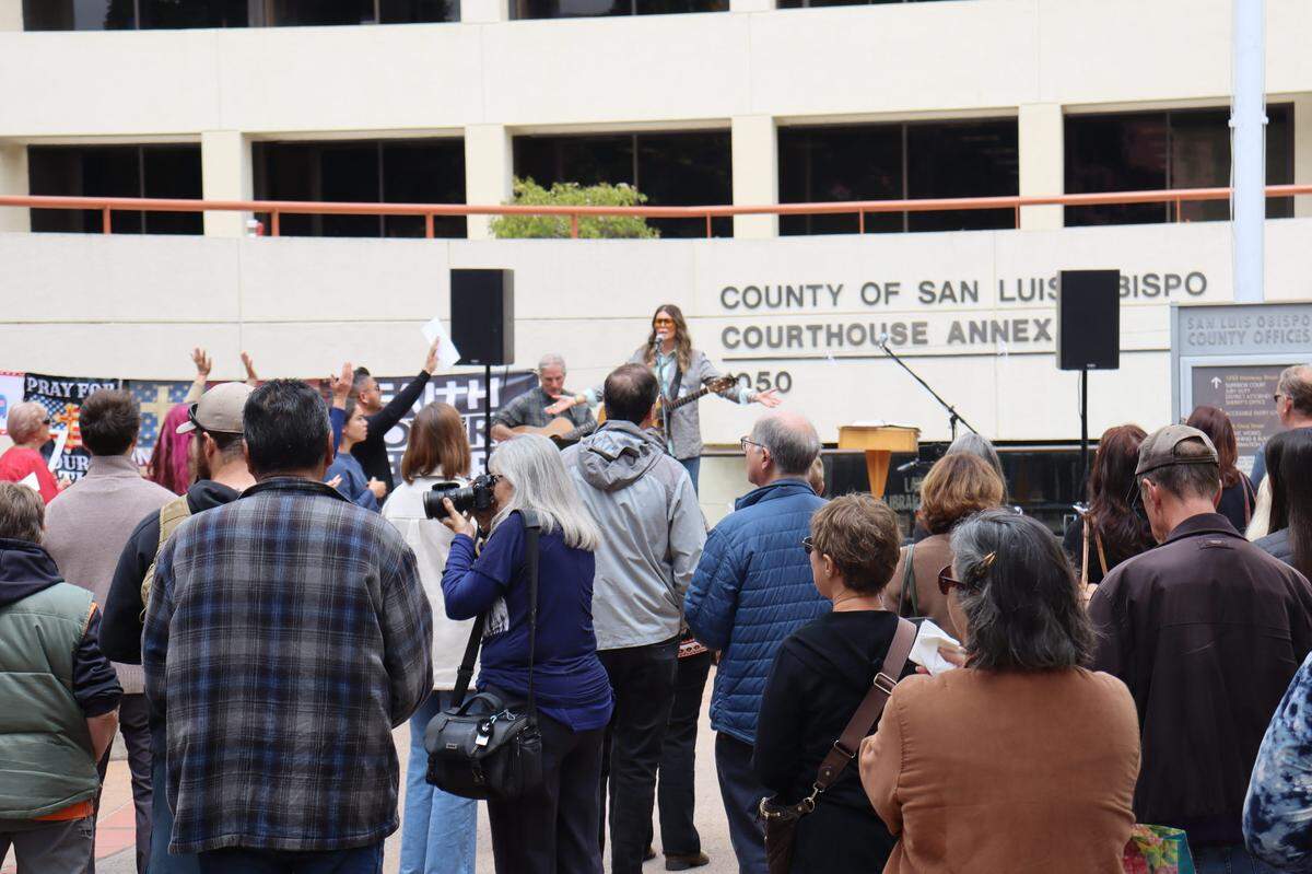 Over a hundred people gathered on the steps of the San Luis Obispo Superior Courthouse to celebrate the National Day of Prayer on Thursday, May 1, 2025, an event led by District Attorney Dan Dow.