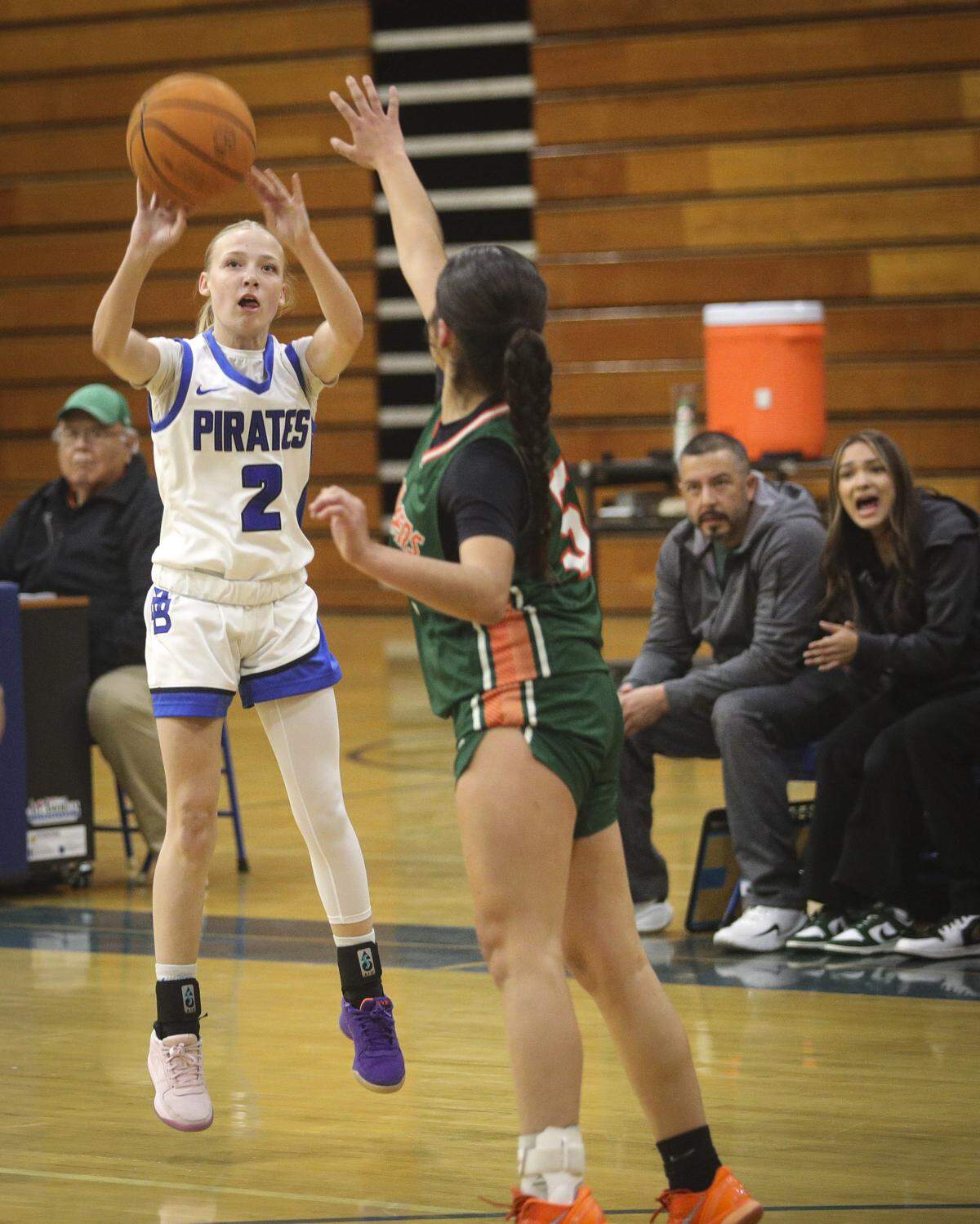 Zoe Fitzwater shoots over Saré Ortiz. Morro Bay beat Porterville 37-25 to advance to the semi-final game in the Division III CIF Central Section Girls Basketball Championships.