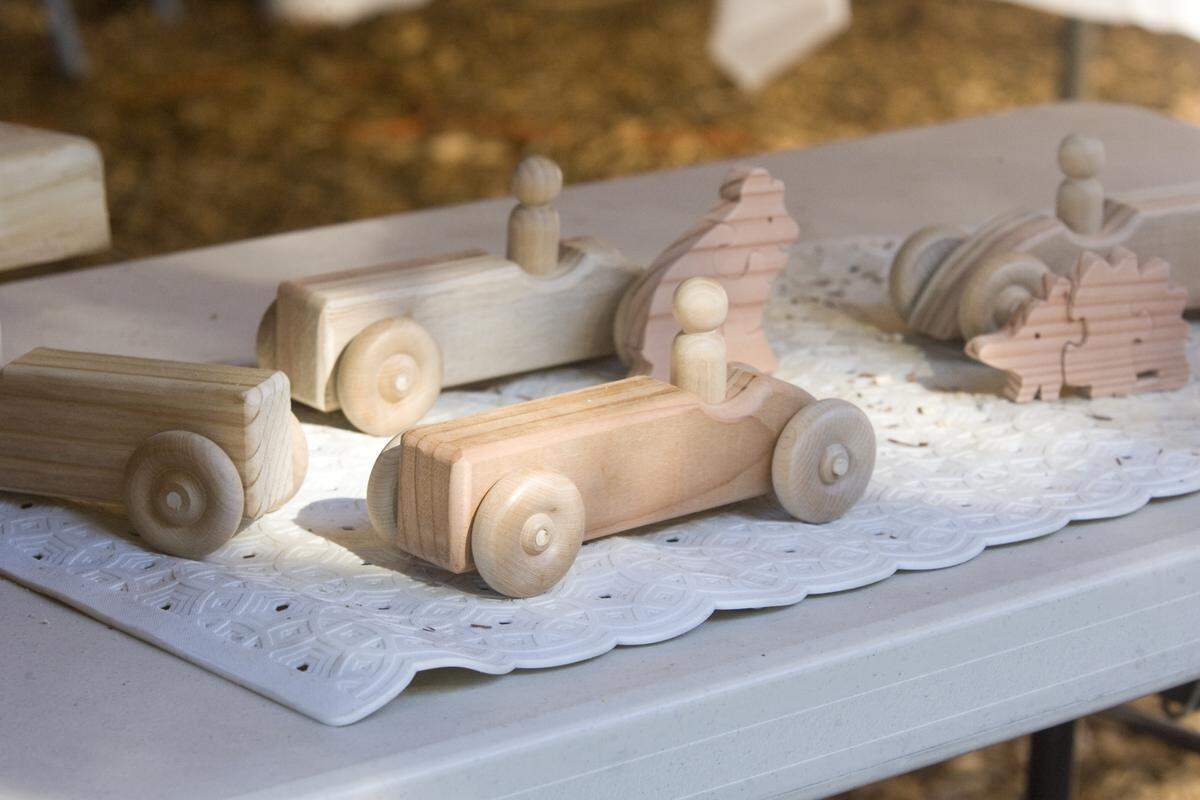 Woodworkers donate toys to the Paso Robles Toy Bank to be distributed to children during the "Day of Giving” on July 23, 2014.