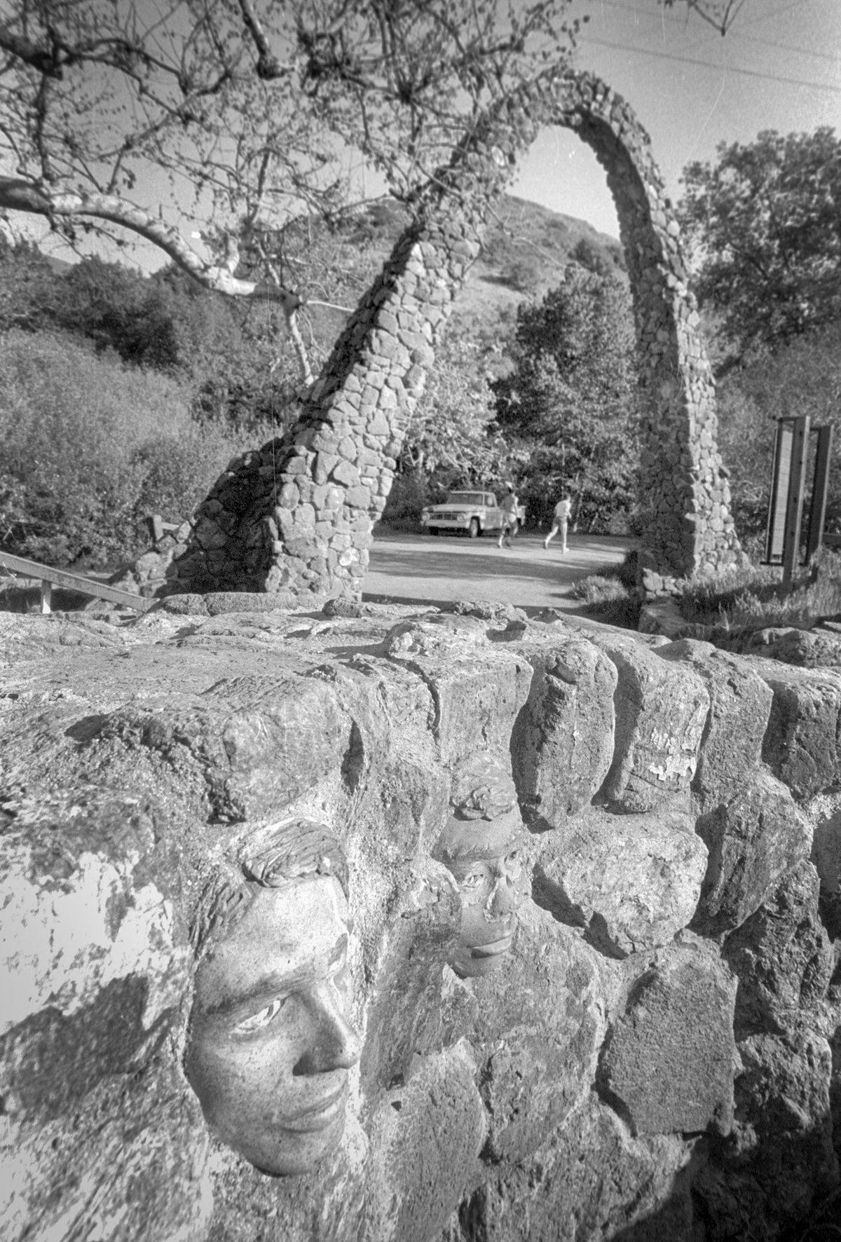 Faces appear in the masonry at the entrance to Poly Canyon in April 1987. The spot on the northeast corner of Cal Poly’s San Luis Obispo campus is home to more than 20 permanent architectural structures and hosts an annual Design Village competition.