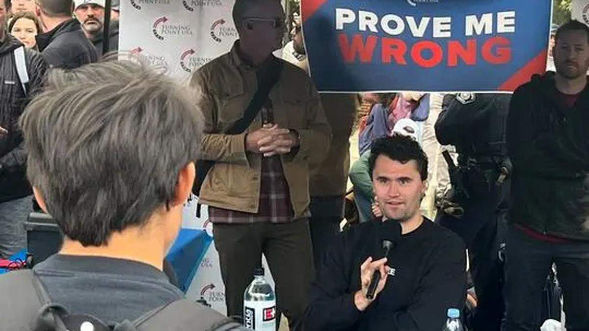 Conservative activist Charlie Kirk speaks to students while hosting a “Prove Me Wrong” table at Cal Poly on March 7, 2024. Kirk was shot and killed while making a similar appearance at Utah Valley University on Sept. 20, 2025.