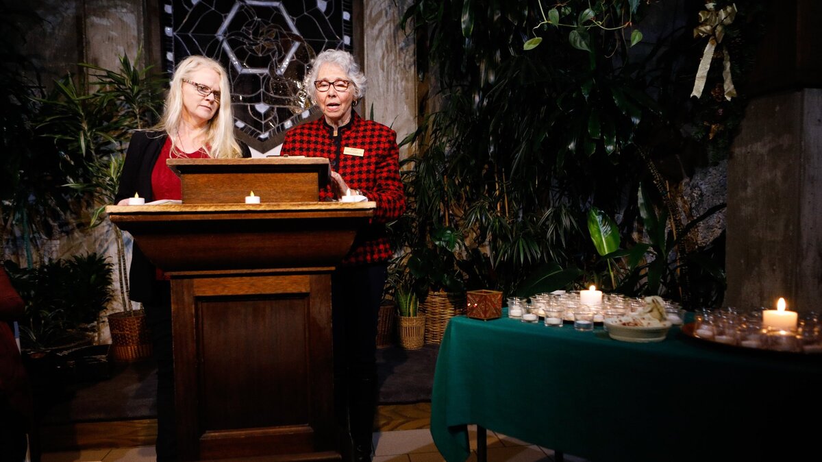 Karen Negri, left, and Victoria Schmidt read the names of loved ones who have passed during the 2018 Light Up a Life event at the Coalesce Bookstore in Morro Bay put on by Hospice of San Luis Obispo County and Dignity Health Hospice. Photo by Joe Johnston 12-02-18