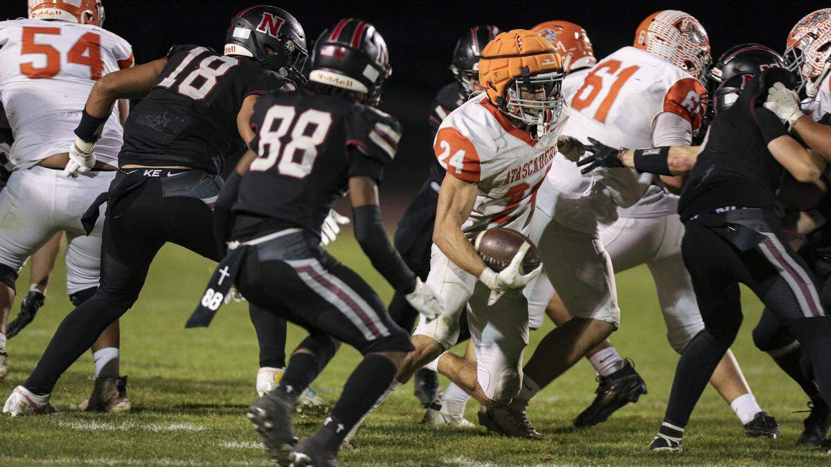 Damon Mitchell runs for the Greyhounds. Nipomo beat Atascadero 35-34 in a double-overtime playoff football game on Nov. 7, 2025.