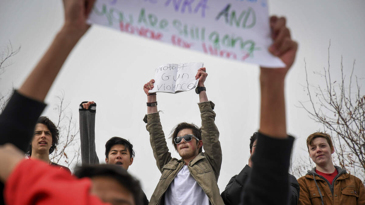 In a Feb. 21, 2018, photo, Colorado high school students lead a protest in support of the Parkland, Florida, shooting victims. Students around the nation will participate in a 17-minute walkout one month to the day after the shooting at Marjory Stoneman Douglas High School.