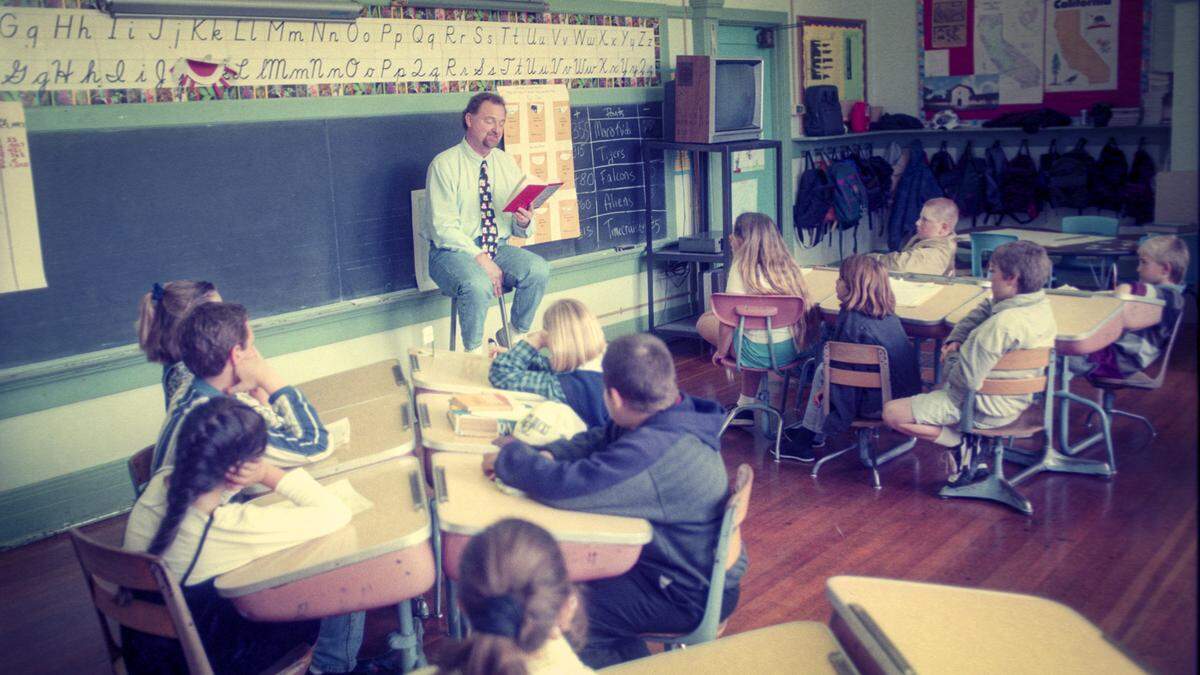 Guy Crabb, the man behind the Morro Elementary School anniversary celebration, teaches fourth grade April 17, 1997.