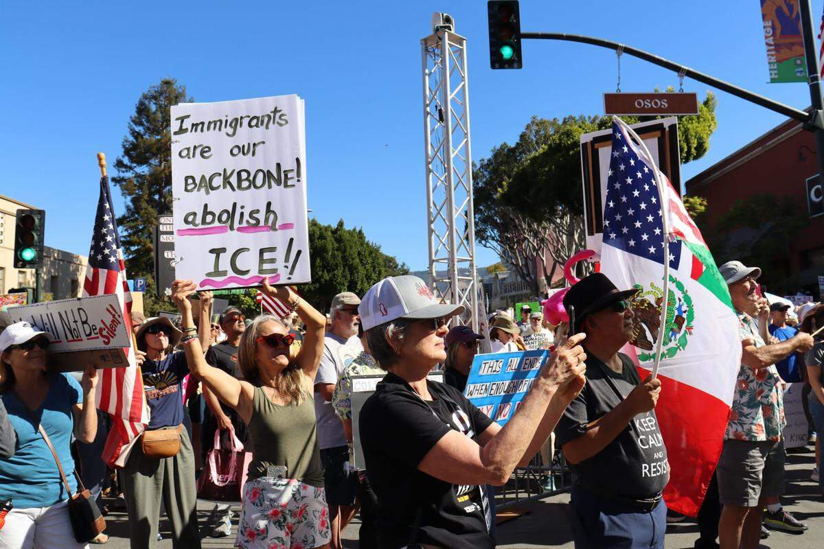 Thousands of people attended the No Kings rally in downtown San Luis Obispo to protest the Trump administration and support Prop. 50 on Oct. 18, 2025.