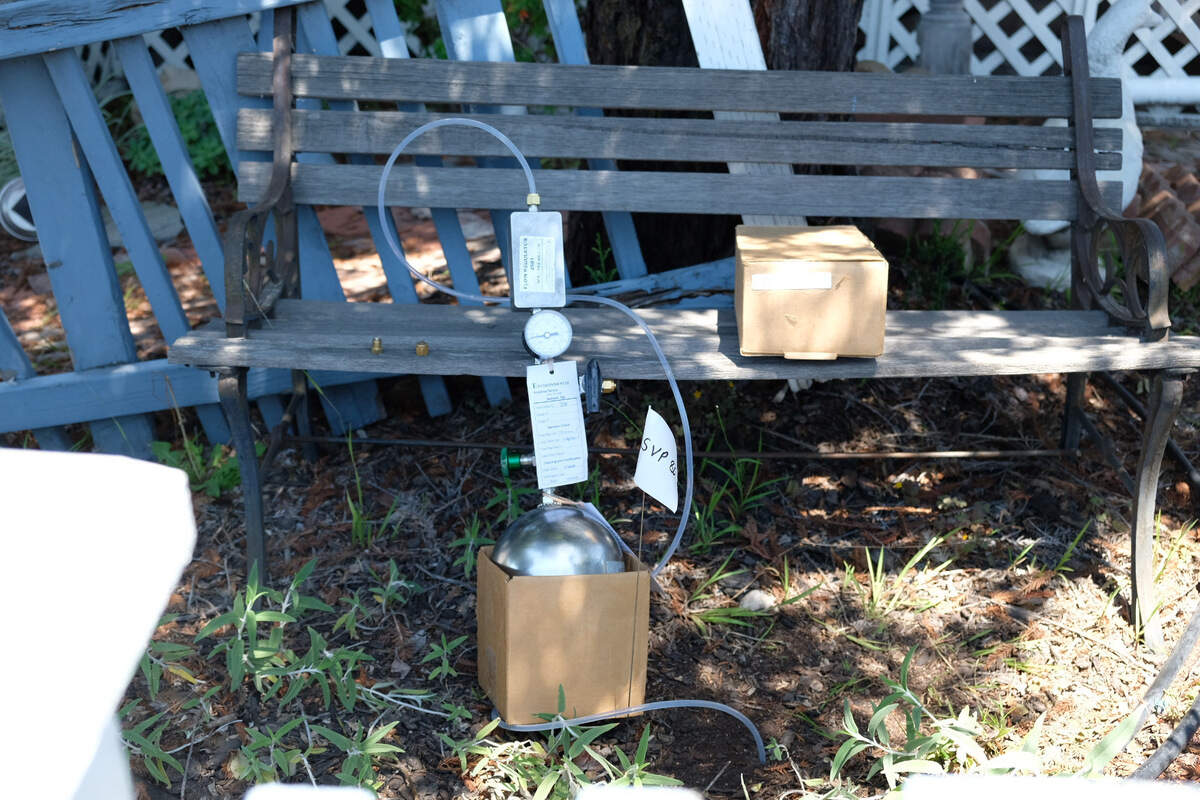 Environmental engineer Timothy Nelligan test the soil in the front yard of the house next door to Susan Flores’ home in Arroyo Grande on Thursday, May 7, 2026, during the second day of a search warrant investigation in the Kristin Smart murder case.