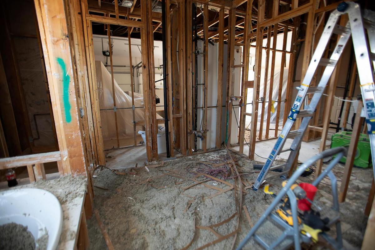 A failed water manifold flooded Don Smith’s Trilogy at Monarch Dunes home, requiring $200,000 and $300,000 of renovation work. The demolition has been going on for three weeks in the bathroom where the leak occurred.
