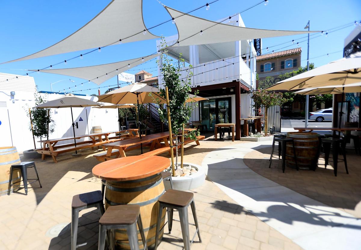 Ancient Owl Beer Garden and Bottle Shoppe, Negranti Creamery and Steller and S.U.N. Hat Company all encompass the stores craftily constructed from shipping containers. The beer garden area for Ancient Owl Brewery. The other stores can use the area too.