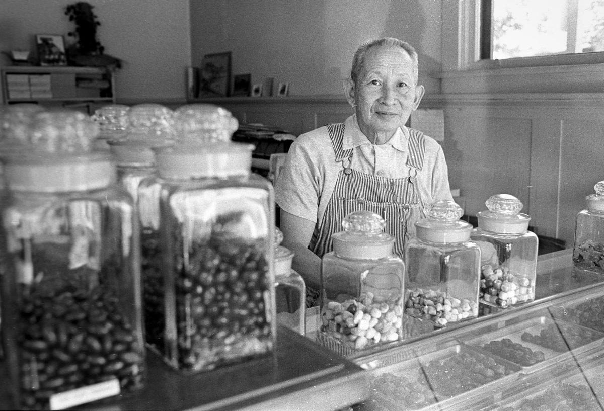 Richard Chong gets up at 6 a.m. or earlier, seven days a week, and walks the several blocks from his rented room to the shop, to cook scotch kisses, caramels, rocky roads, nut rolls, toffees, nougats, chocolate-covered nuts and other mysteries. His candy store was a fixture in San Luis Obispo for the better part of three decades. Seen here Nov. 25, 1974.