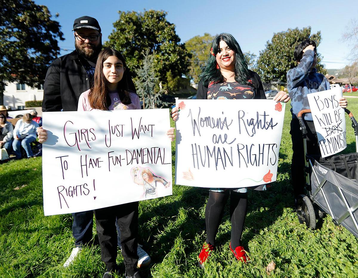 Women’s March attendees hold signs at Mitchell Park. Planned Parenthood of San Luis Obispo sponsored the event this year on Saturday, Jan. 21, 2023, in San Luis Obispo.