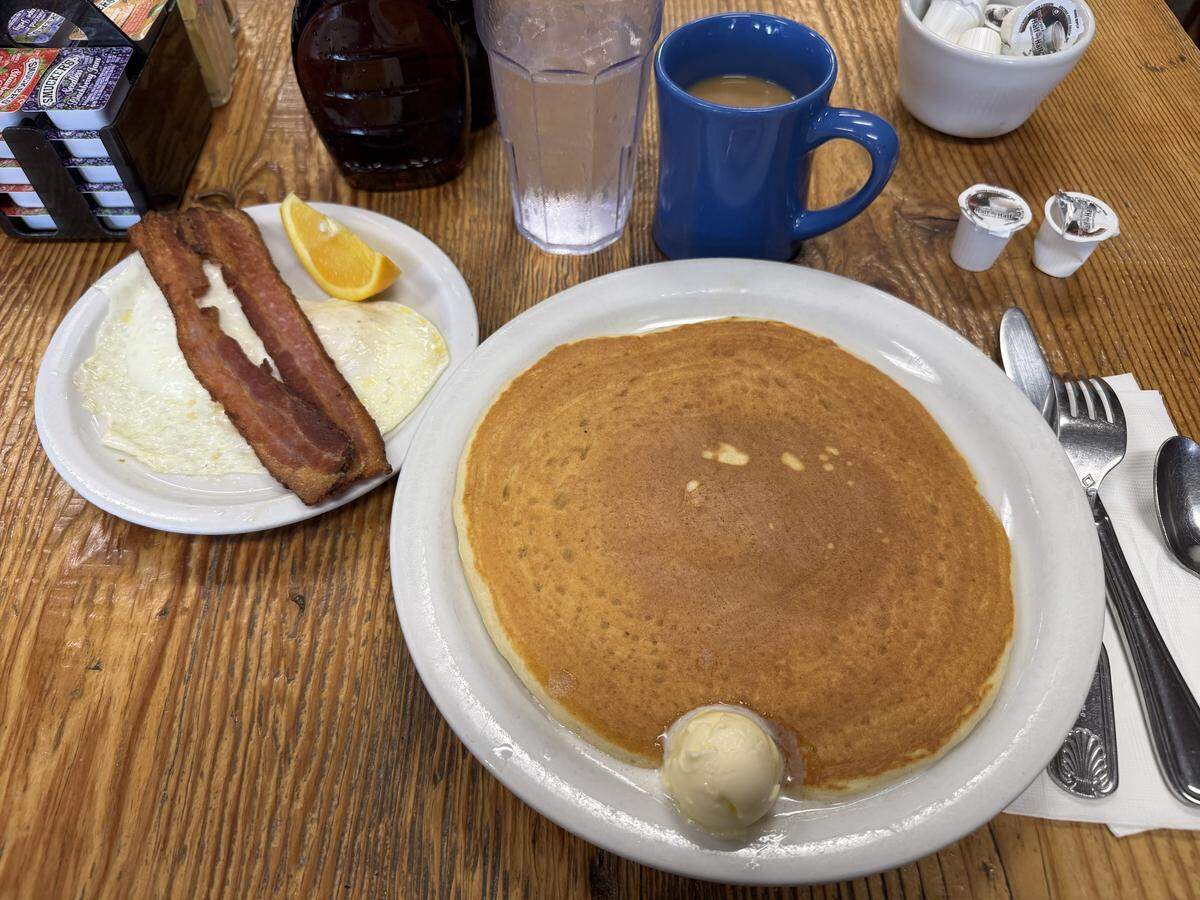 The Mini Ranch at Budget Cafe in San Luis Obispo includes one pancake, two eggs and two strips of bacon or link sausage.