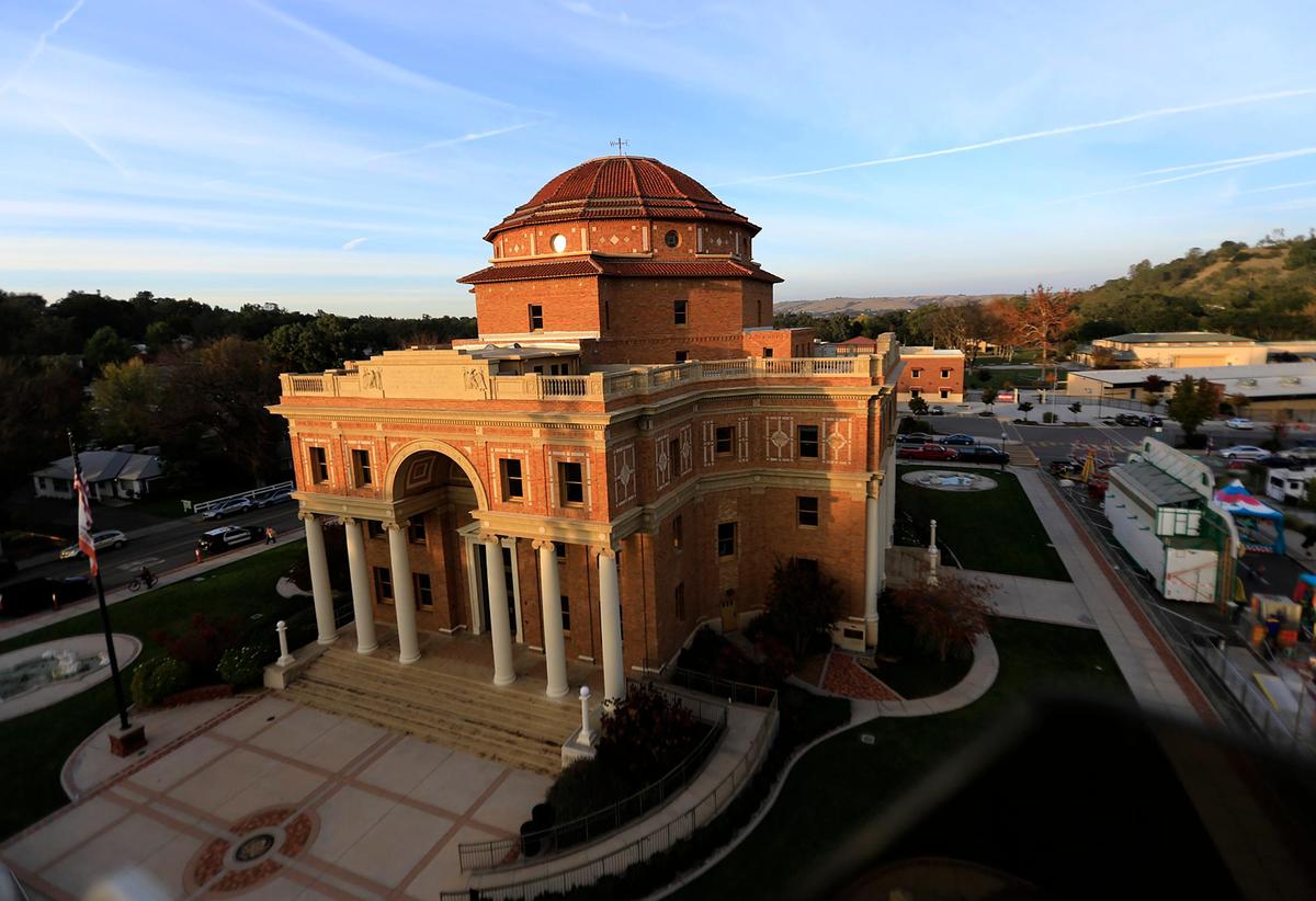 The Atascadero Fall Festival’s Ferris wheel offers a view of City Hall. The event brought carnival rides and games, live music, food and a beer garden to Sunken Gardens for three days, from Friday to Sunday, Nov. 19-21, 2021.