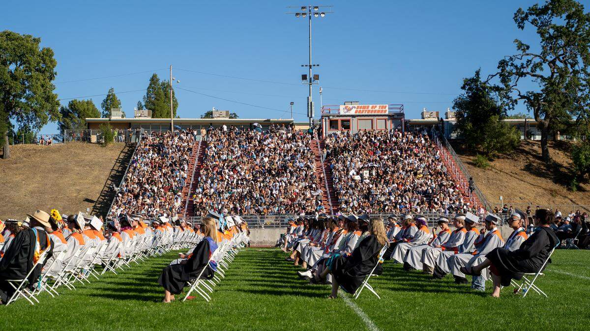 Atascadero High School listen to a speaker during commencement ceremonies on Wednesday, June 3, 2026. 296 seniors walked the stage and received their diplomas.