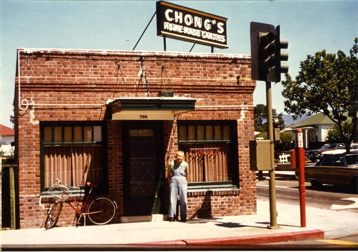 Richard Chong poses for a photo outside of his sweet shop, Chong’s Home Made Candy Store, in San Luis Obispo.