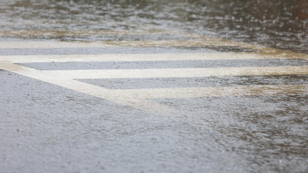 A high tide and rain in Avila Beach combined to close First Street at San Francisco Street due to flooding, putting a crosswalk underwater. A major winter storm hit SLO County on Wednesday.