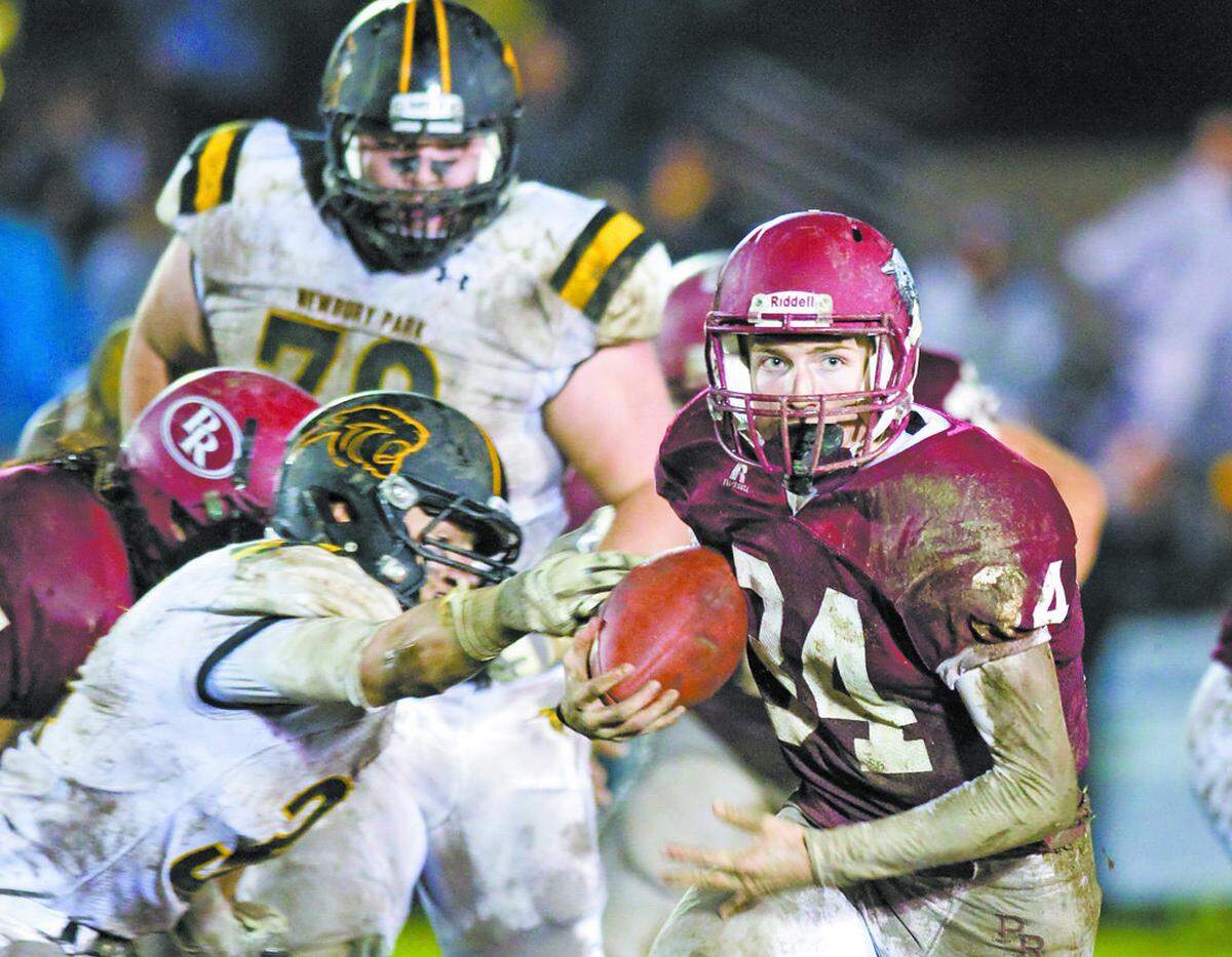 Paso Robles High’s Bailey Gaither (34) looks for running room in the Bearcats’ 13-10 win over Newbury Park in December 2014 in the CIF-Southern Section Northern Division championship game.