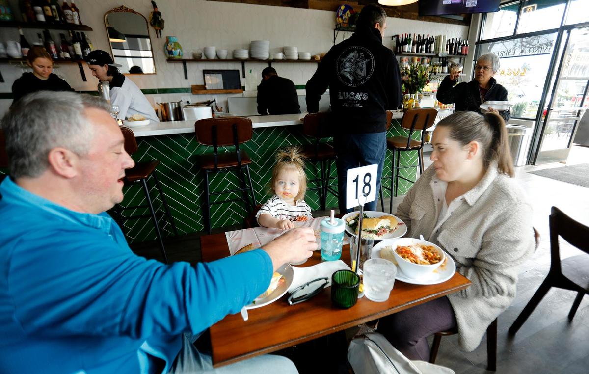 James and Nicky Cooke, of Arroyo Grande, bring 1-year-old daughter, Bailey, to lunch at Luca’s Sicilian Wine & Deli.