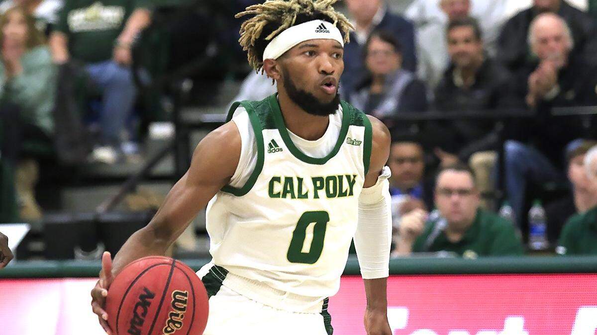 Cal Poly’s Keith Smith (0) looks for an opening. Cal Poly loses 63 - 45 to U.C. Santa Barbara at Mott Gym, Wednesday, January 8, 2020. Smith played his last game Wednesday against UC Irvine in the Big West tournament on March 11, 2021. Irvine won 58-51.
