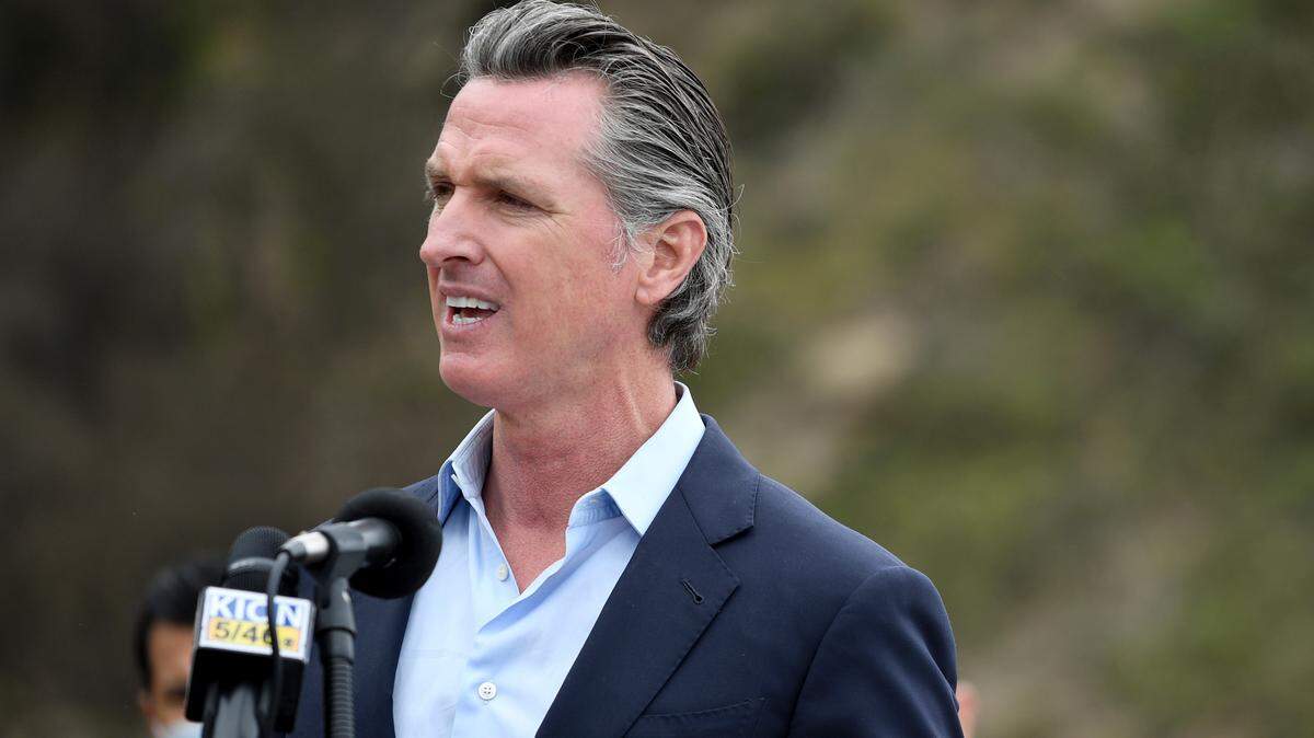 California Gov. Gavin Newsom speaks during a news conference about the newly reopened Highway 1 at Rat Creek near Big Sur in April 2021. Newsom will be in San Luis Obispo County on Thursday, July 8, 2021, to discuss the ongong drought and proposed investments to address water resiliency.