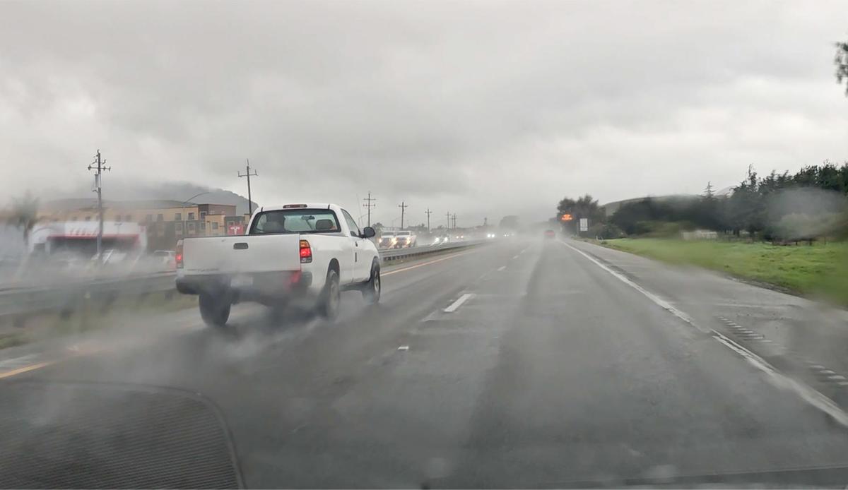 Driving through heavy rain along northbound Highway 101 in San Luis Obispo on Feb. 6, 2025. 