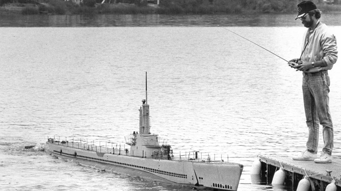 Steve Anderson mans the control board of a World War II submarine replica to be used in the TV series “War and Remembrance” in 1988. Scale Effects tested multiple models at Laguna Lake in San Luis Obispo before shipping them to London for filming.
