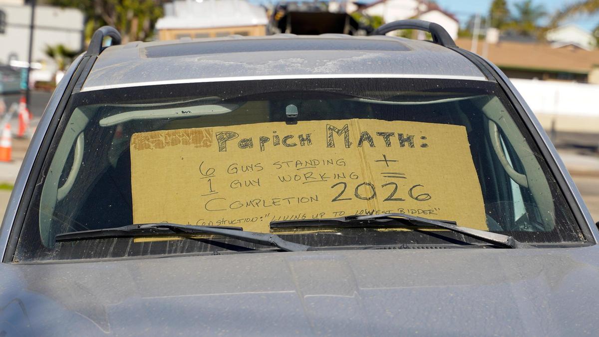 A vehicle near West Grand Avenue in Grover Beach displays a sign expressing dissatisfaction with Papich Construction’s work on the West Grand Avenue Streetscape Fourth-Eighth Street Project Thursday, Jan. 9, 2025. The $4.2 million project will makes significant changes to the road between Fourth Street and Eighth Street, with construction projected to last until the spring or summer of 2025.