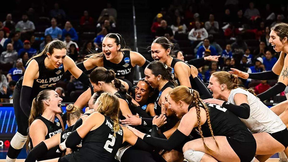 Cal Poly’s volleyball team celebrates its NCAA Championship Tournament win over BYU in the first round on Dec. 4, 2025, at USC’s Galen Center.