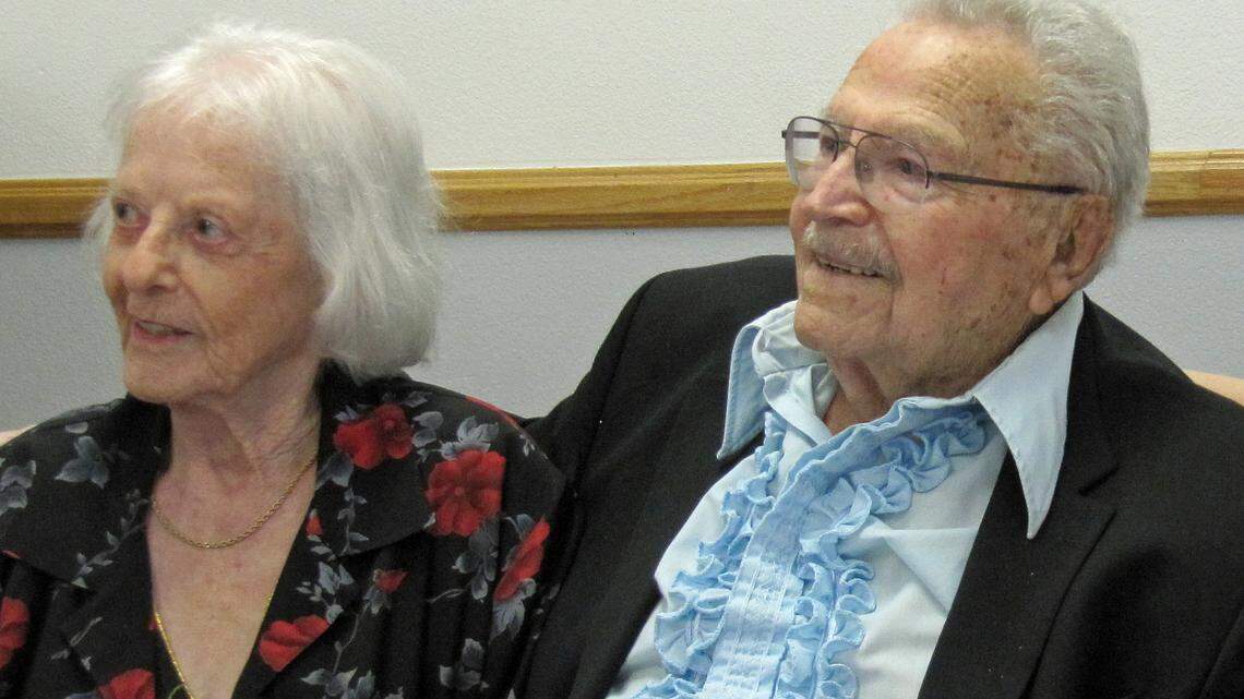 Nehemiah “Nicky” Persoff, right, of Cambria celebrates his 100th birthday party Saturday along with his wife, Thia.