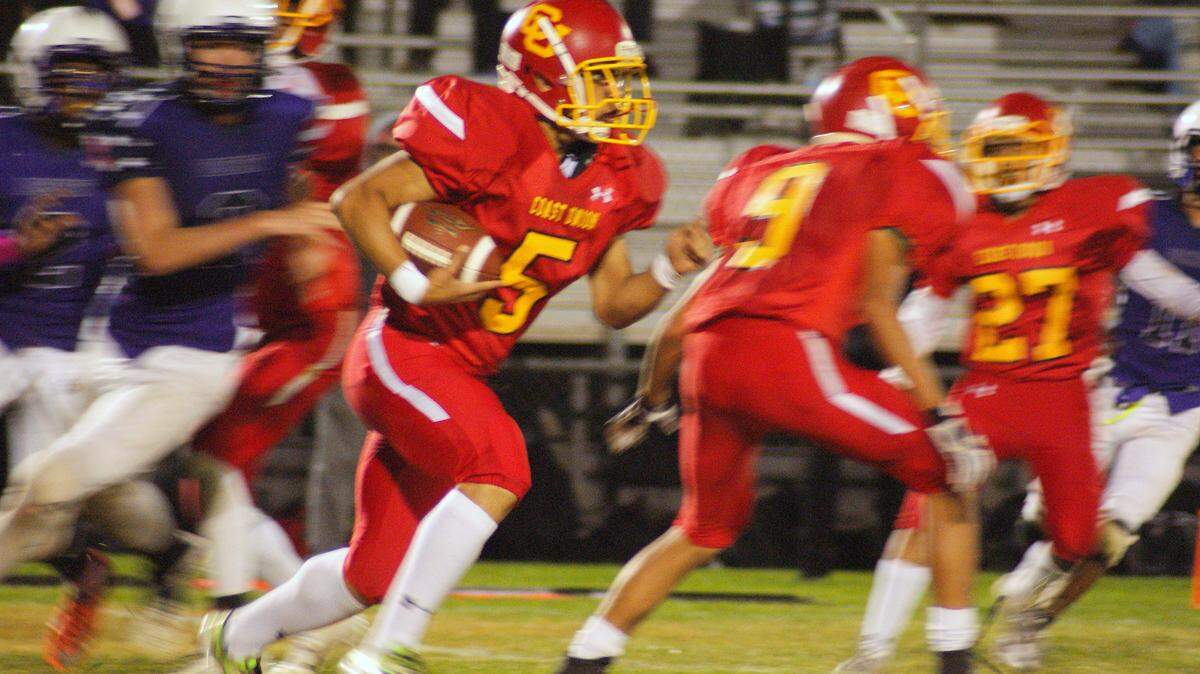 Junior Rigo Mejia handled kickoff return duties for Coast Union High School in the game against Desert High School on Friday, Oct. 19. Here he returns a kickoff in the second half of Coast’s 62-49 loss.