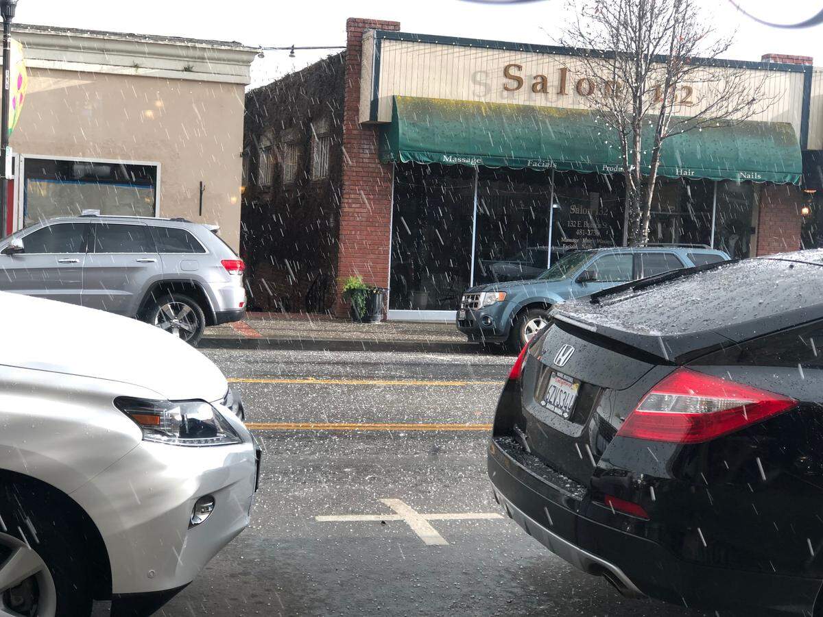 Sleet and hail falling in The Village of Arroyo Grande.