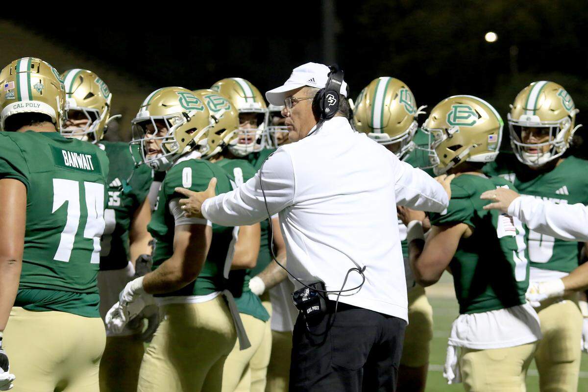 Cal Poly head coach Paul Wulff rallies the team. Cal Poly lost to UC Davis 34-27 in a college football game at Mustang Memorial Stadium on Oct. 4, 2025.
