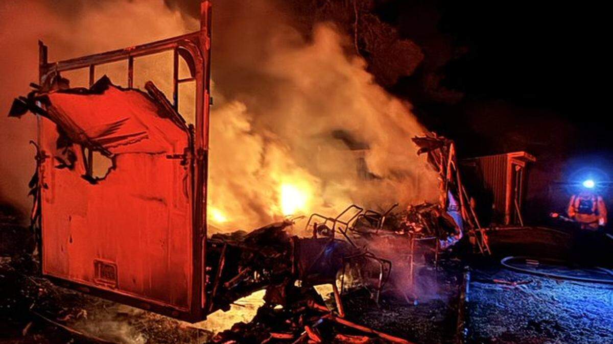 A travel trailer fully involved in a vegetation fire on Saturday, Oct. 11 near Santa Margarita.