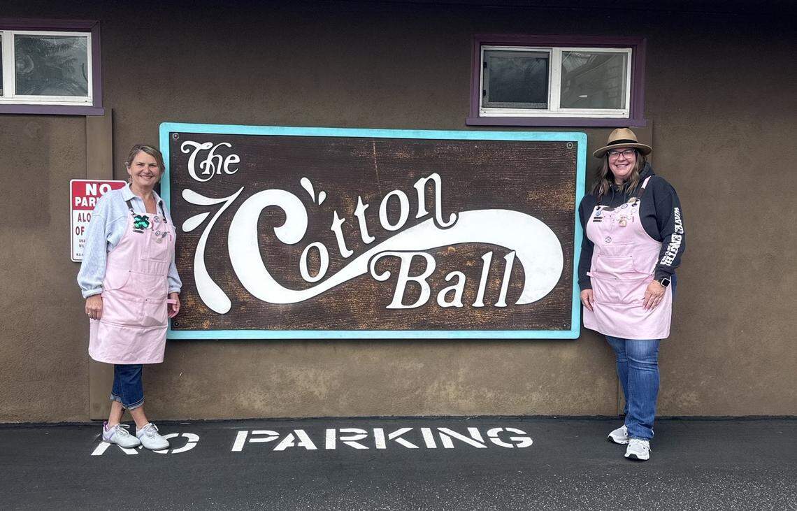 Co-owners Lori Stollmeyer, left, and Alison Virge have owned The Cotton Ball fabric and quilting store in Morro Bay since 2012. They’re closing the store Aug, 25, 2025, but say some fabrics and other specialties will be available online soon.