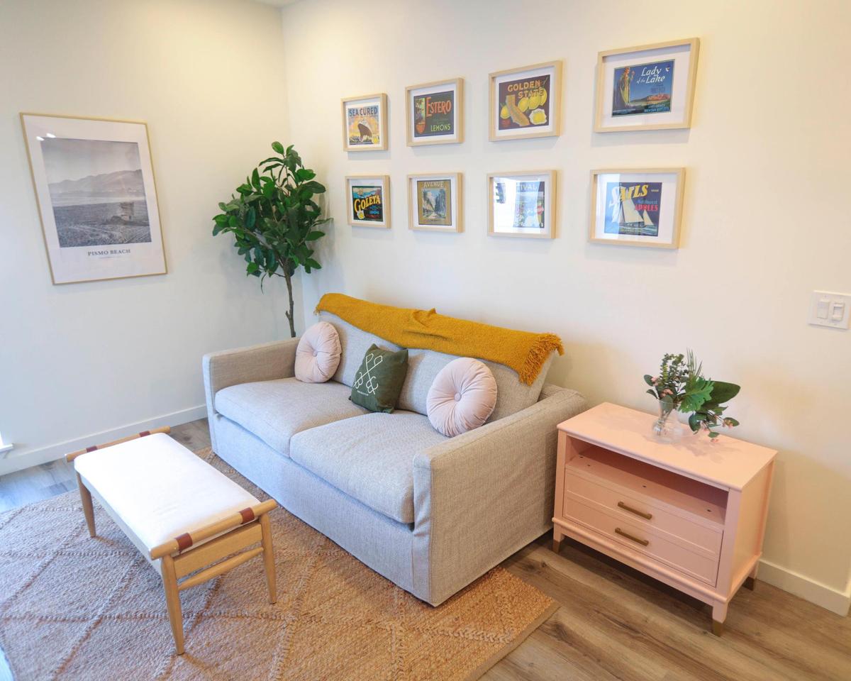 Suites have living spaces with colorful California-themed artwork like fruit lables. Renovated and renamed, Pismo Beach Club is located on Price Street, seen here Jan. 21, 2025.