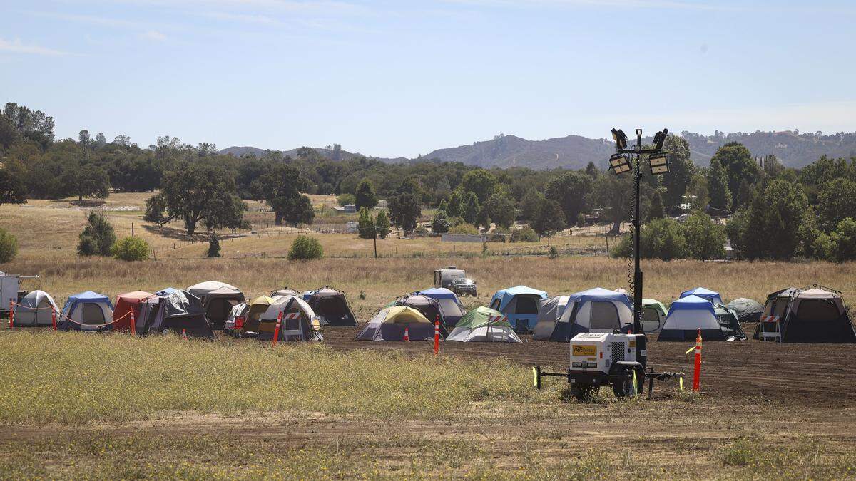 A fire camp was assembled at Santa Margarita Ranch to serve thousands of firefighters battling the Gifford Fire, seen here on Aug. 7, 2025.