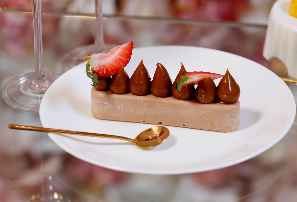 The Milk Passion is made with gourmet Valrhona milk, chocolate whipped into a mousse, topped with passion fruit gelée rounds and sweet dulce de leche.