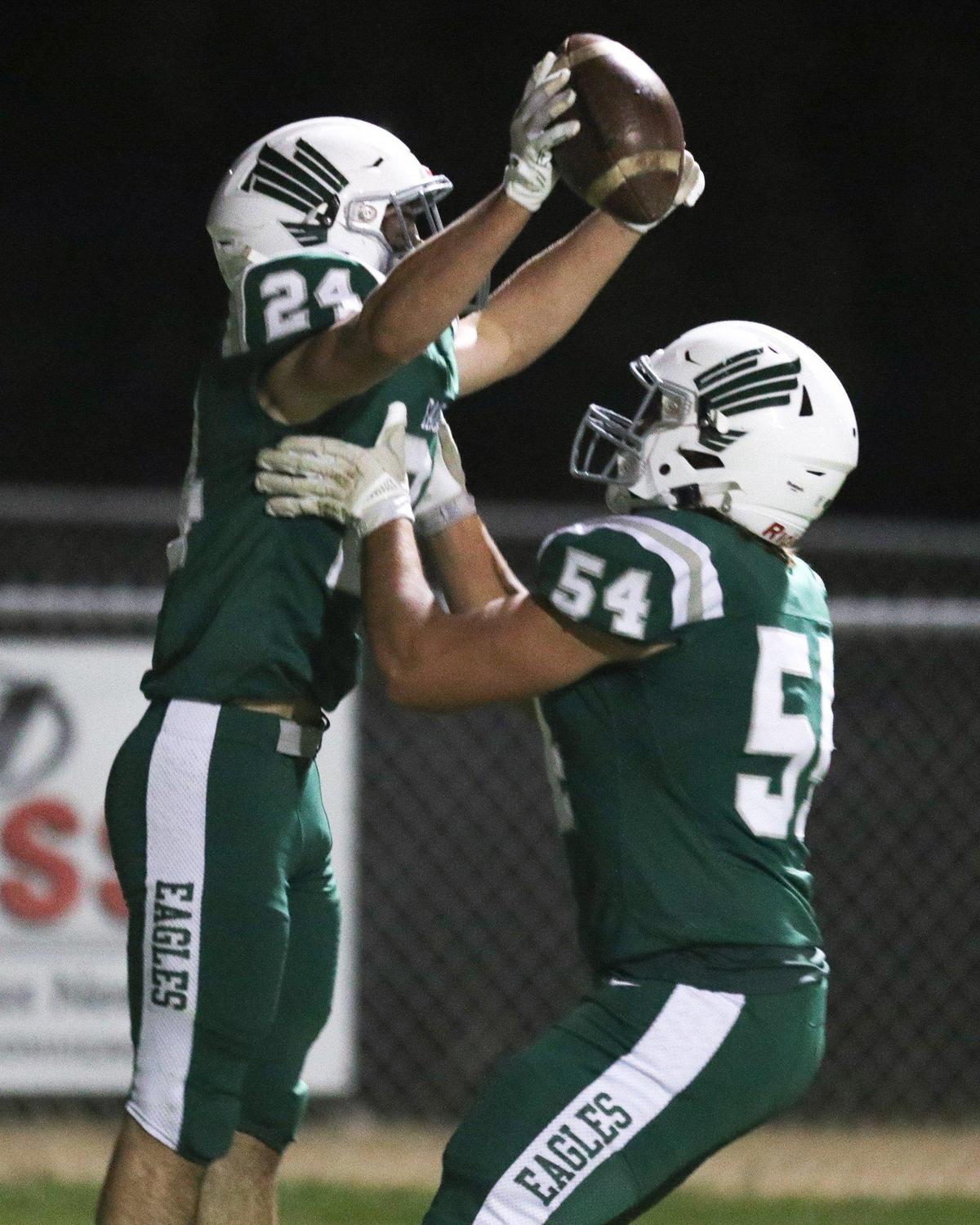 Lane Miller celebrates a touchdown while getting a lift from Johnny Peschong. San Luis Obispo beat Templeton 17-14 on Oct. 27, 2023, in the last game of the Ocean League’s regular football season.