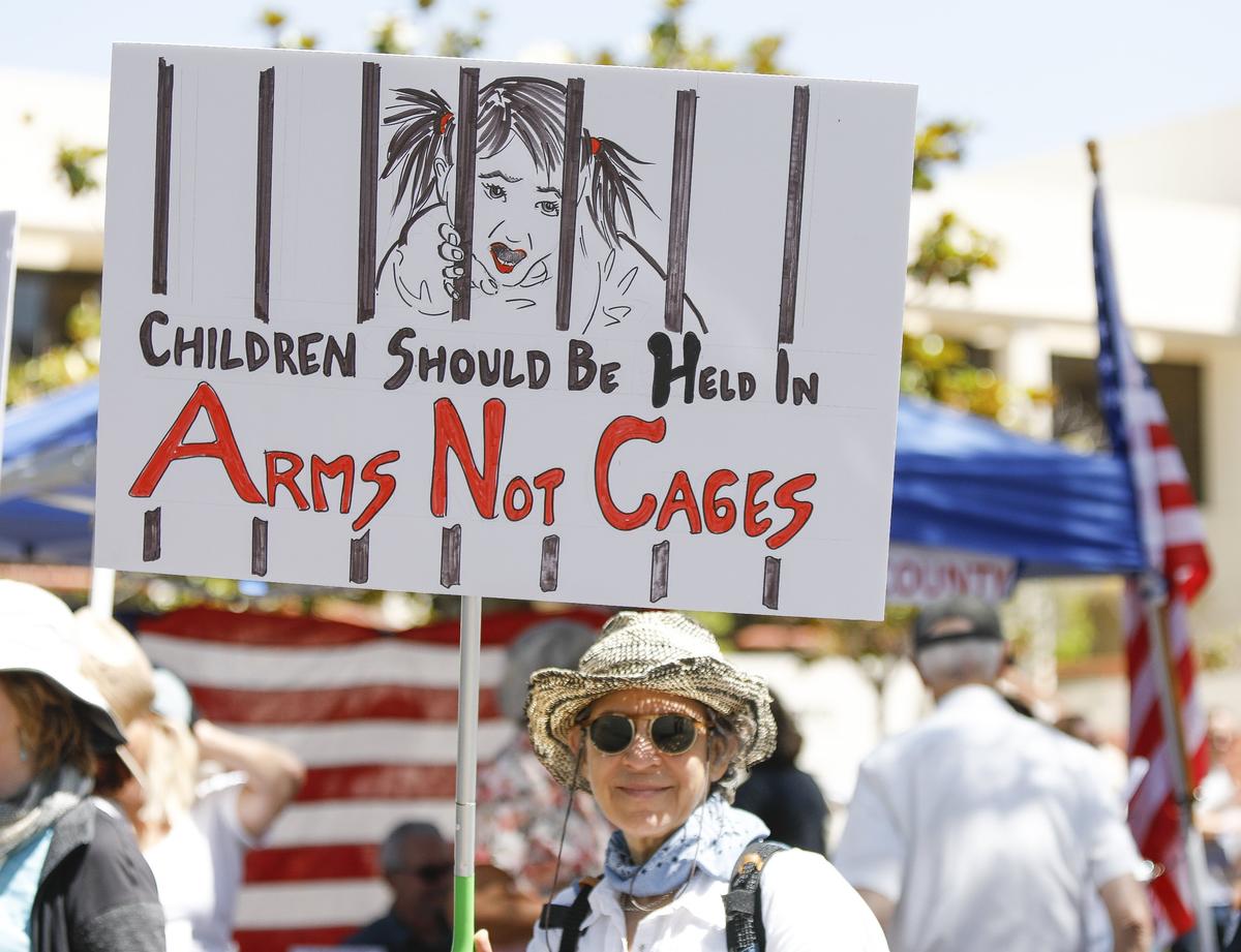 National Day of Action held a protest and march Saturday in San Luis Obispo, beginning in front of the San Luis Obispo County Courthouse. About 1,500 people attended the event.