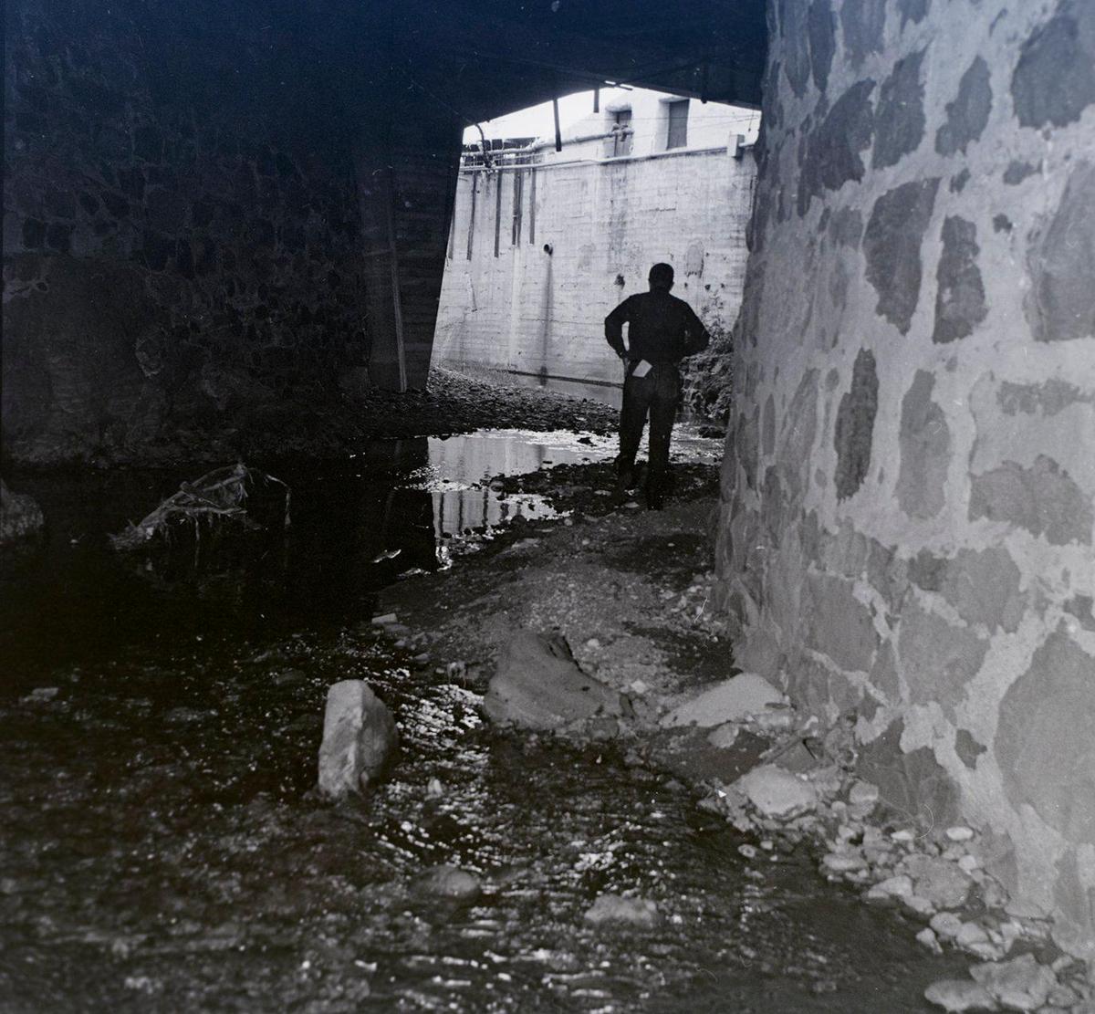 The creek finds its way beneath the City of San Luis Obispo. Reporter Gil Bailey and photographer John Dreyfuss took a walk down a junk filled San Luis Obispo creek before Mission Plaza was built for a story published Dec. 28, 1963.