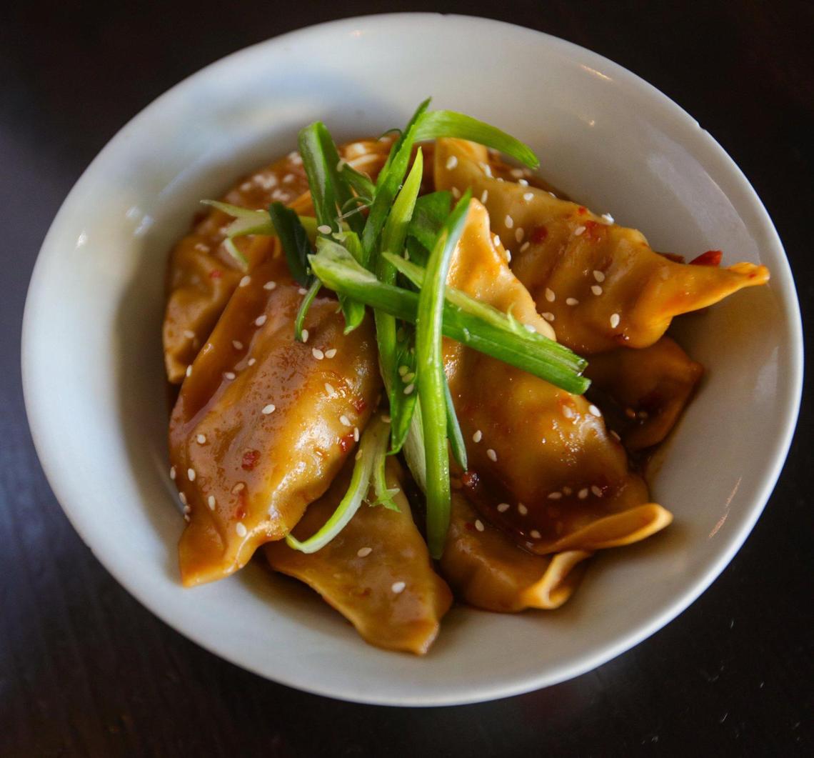 Chef Russell Kwong’s pork dumplings are simmered in in hot and sour sauce at Mee Heng Low, which has for nine decades been a central business in San Luis Obispo’s Chinatown.