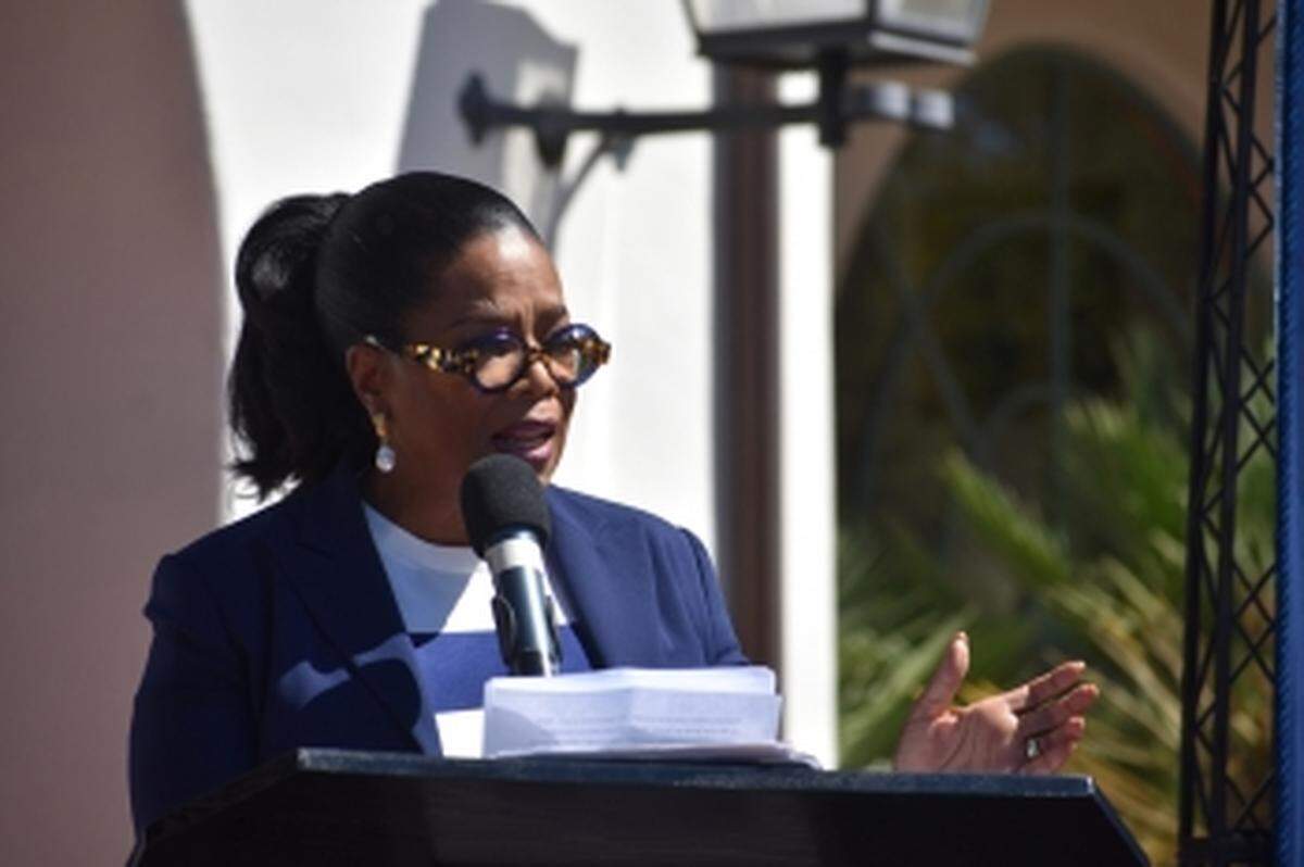 Montecito resident Oprah Winfrey speaks during a U.S. Postal Service stamp dedication ceremony held Friday.