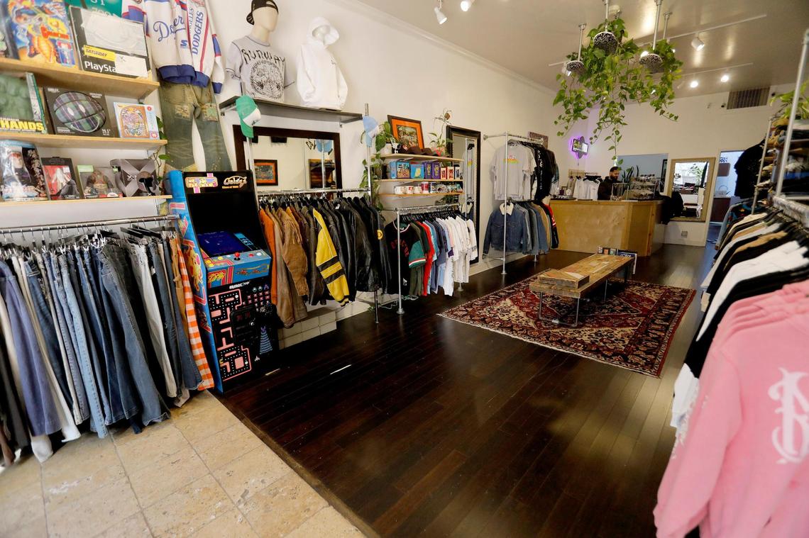 Racks of vintage clothing hang neatly in Jeff’s on Monterey Street in San Luis Obispo. Vintage and secondhand stores in downtown San Luis Obispo offer sustainable fashion pieces and accept attire for cash or store credit.